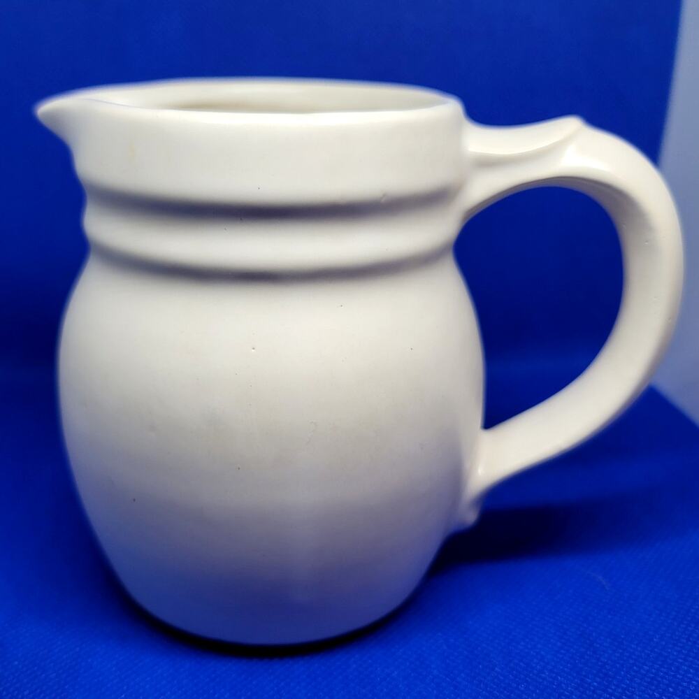 Vintage McCoy Pottery Ivory Pitcher Ribbed Neck USA Manufactured 1270 4" Tall